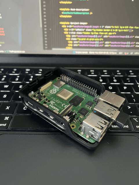 Raspberry PI 4 with my macbook in the background.